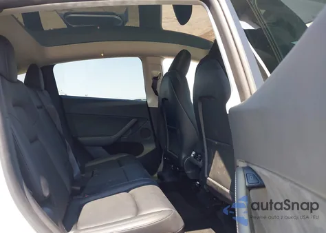 2023 Tesla Model Y Awd/Long Range Dual Motor All-Wheel Drive z USA, uszkodzony, nr VIN 7SAYGAEE3PF826073